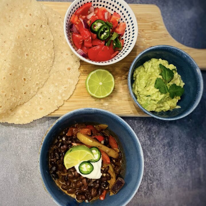 Vegetarian Black Bean Chilli with Guacamole and Salsa